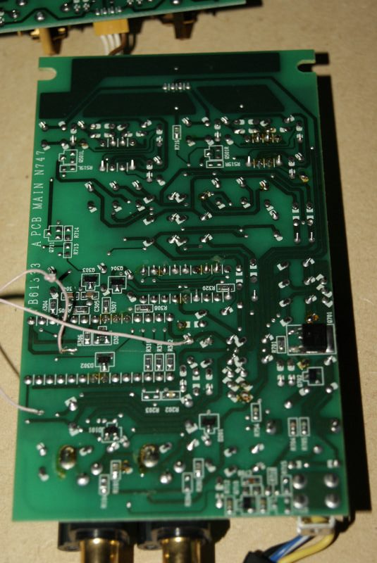Обратная сторона платы Nakamichi DAC-41 с дорожками и монтажом